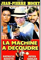 Jean-Pierre Mocky, Patricia Barzyk, and Pierre Semmler in La machine à découdre (1986)