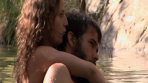 A couple's honeymoon is cut short when they encounter some feral strangers in the wilderness.