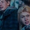 Katherine McNamara and Jacob Lofland in Maze Runner: The Scorch Trials (2015)