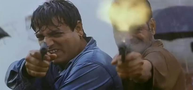 Rajesh Joshi and Sanjay Mishra in Satya (1998)