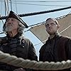 Patrick Lyster and Roland Reed in Black Sails (2014)