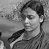 Supriya Choudhury and Niranjan Ray in Meghe Dhaka Tara (1960)