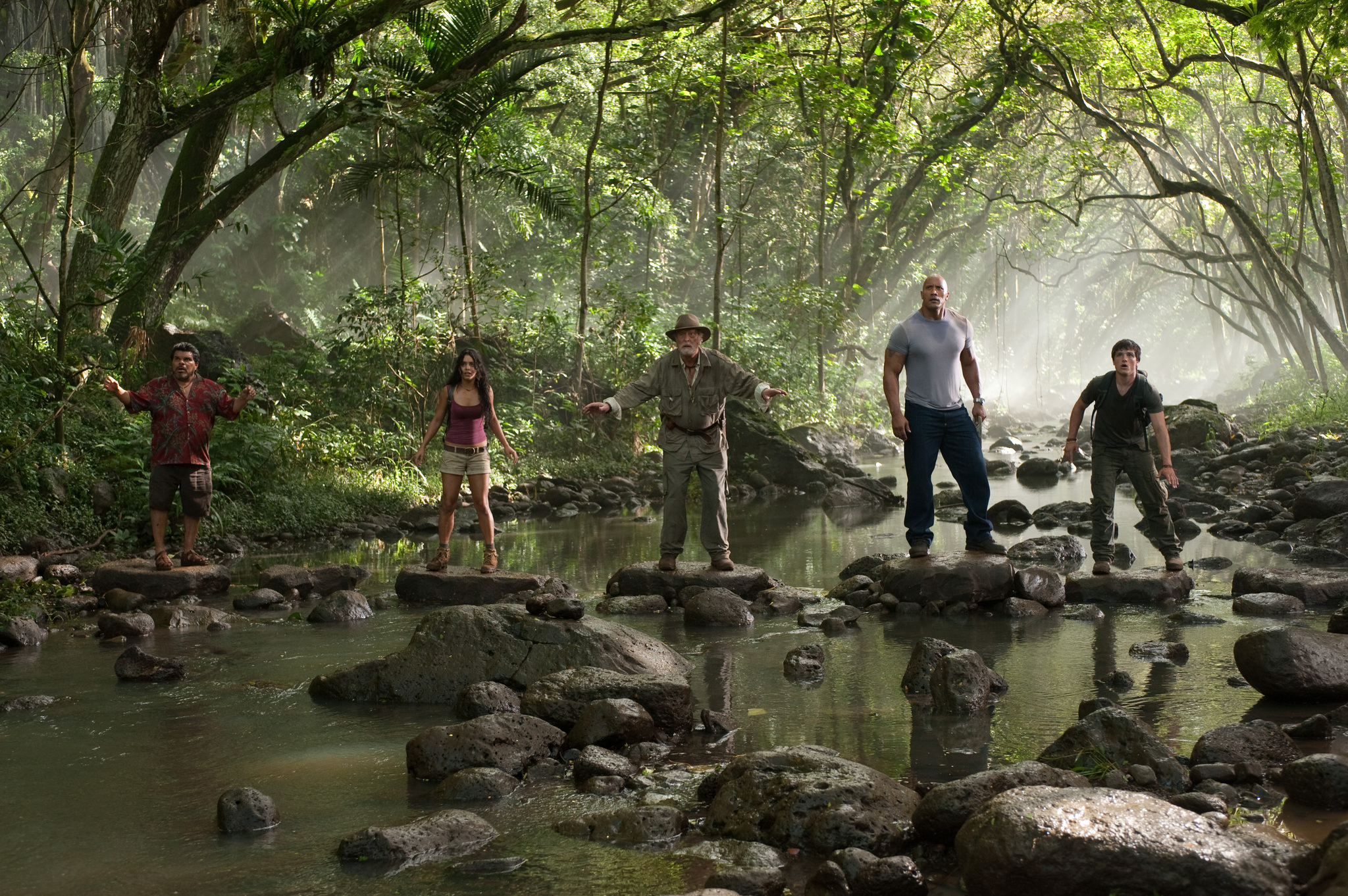 Michael Caine, Luis Guzmán, Dwayne Johnson, Vanessa Hudgens, and Josh Hutcherson in Hòn Đảo Huyền Bí (2012)