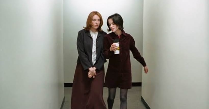 Parker Posey and Toni Collette in Clockwatchers (1997)