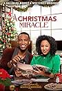 Tamera Mowry-Housley and Brooks Darnell in A Christmas Miracle (2019)