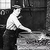 Buster Keaton in The Blacksmith (1922)