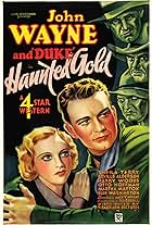 John Wayne and Sheila Terry in Haunted Gold (1932)