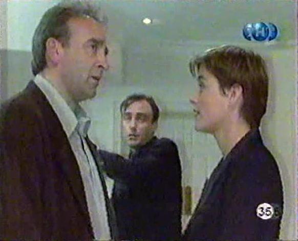 John Bowe, Louise Lombard, and Nick Reding in Bodyguards (1996)