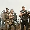 John Goodman, John C. Reilly, Brie Larson, Tom Hiddleston, Tian Jing, Marc Evan Jackson, Eugene Cordero, Thomas Mann, Corey Hawkins, and Jason Mitchell in Kong: Skull Island (2017)