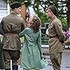 Mark Vdovin, Gleb Bochkov, and Lubov Konstantinova in Podolskie kursanty (2020)