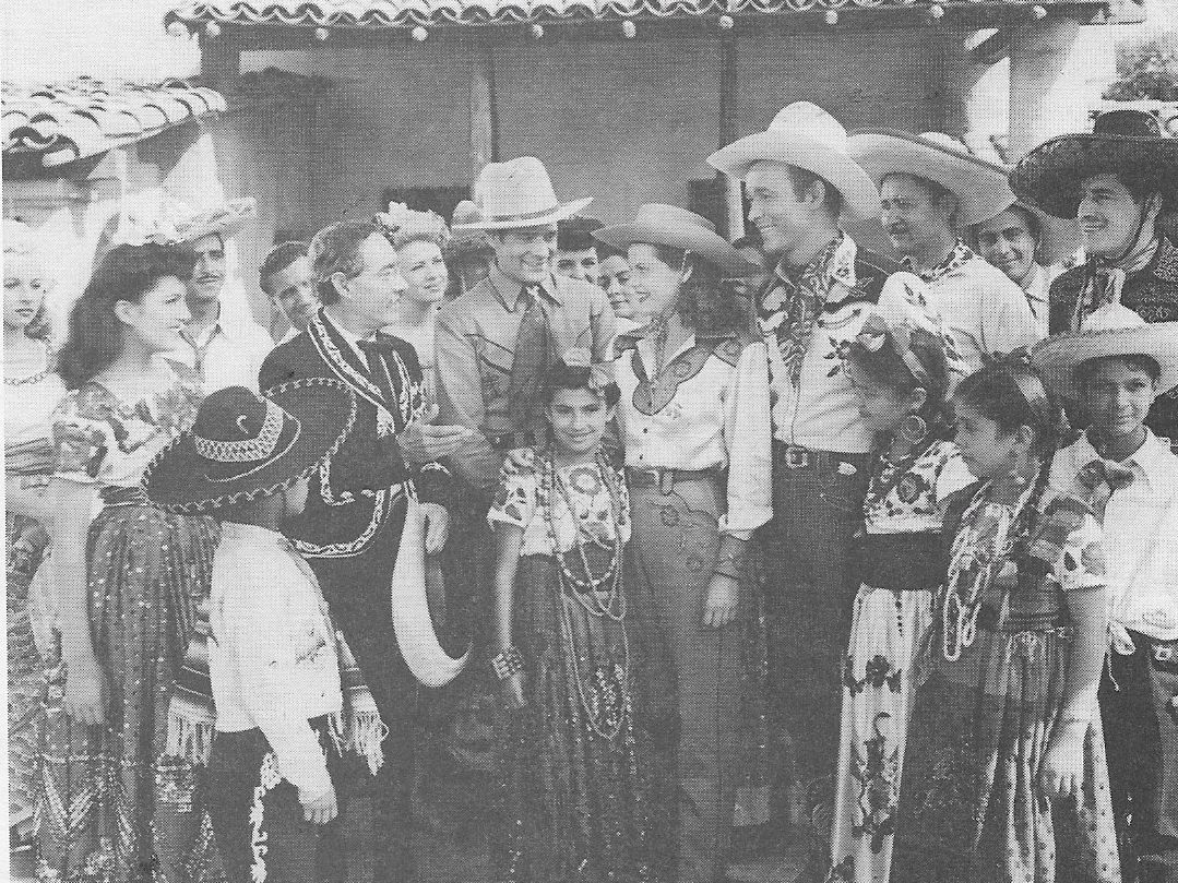 Roy Rogers, Sherry Cameron, Ken Carson, Janet Martin, Duncan Renaldo, Julian Rivero, and Ruth Terry in Hands Across the Border (1944)