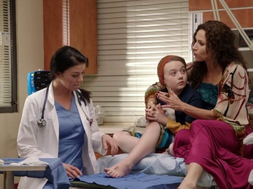 Minnie Driver, Adrianne Palicki, and Benjamin Stockham in About a Boy (2014)