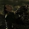 Adewale Akinnuoye-Agbaje and Tom Hiddleston in Thor: The Dark World (2013)