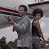 Olivia Brown and Philip Michael Thomas in Miami Vice (1984)