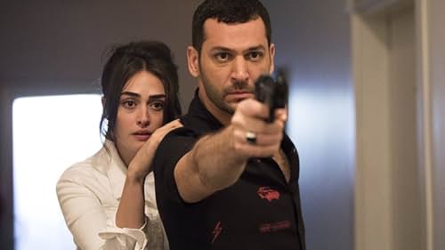 Murat Yildirim and Esra Bilgiç in Ramo (2020)