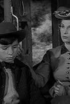 Bobby Clark and Barbara Eiler in Tales of Wells Fargo (1957)