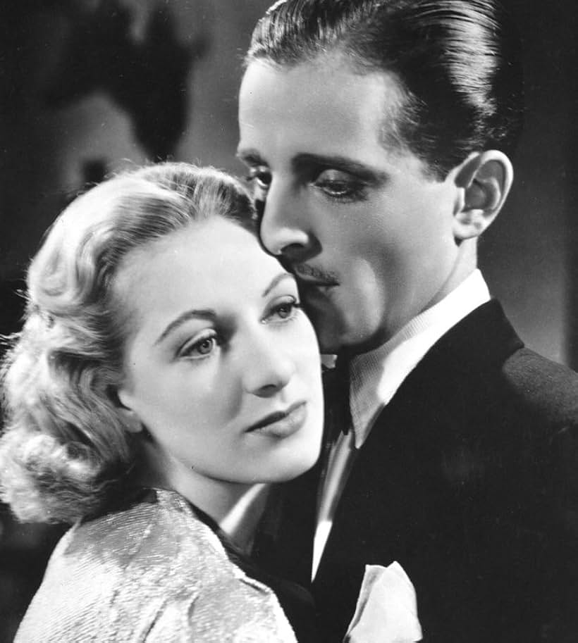 Diana Churchill and Phillips Holmes in Housemaster (1938)