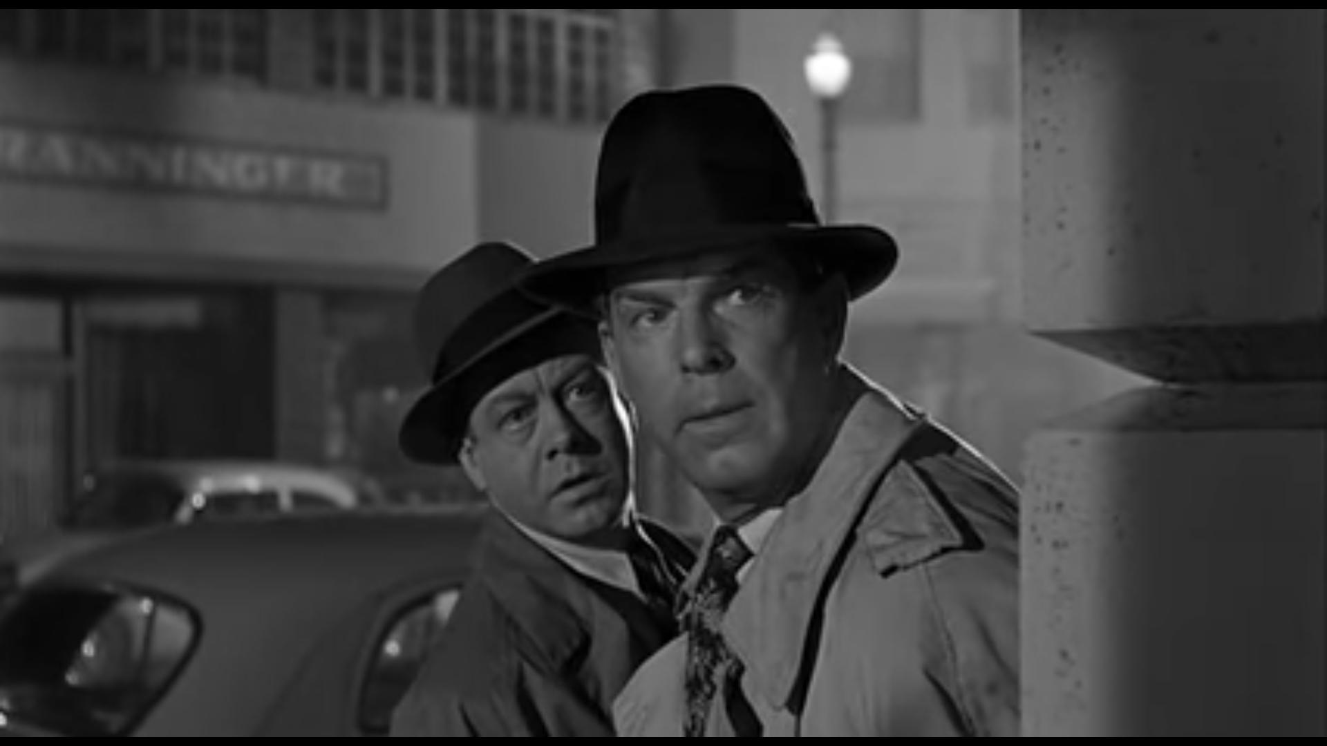 Phil Chambers and Fred MacMurray in Pushover (1954)