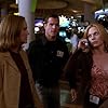 Marg Helgenberger, George Eads, and Jorja Fox in CSI: Crime Scene Investigation (2000)