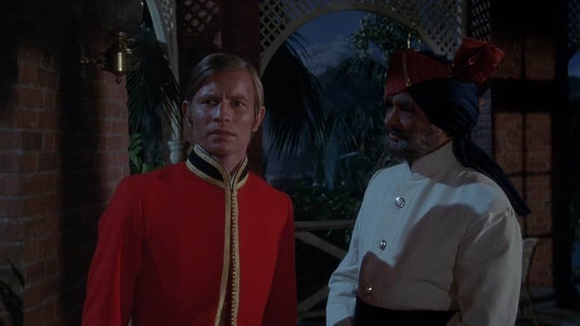 Michael York and Rafiq Anwar in Conduct Unbecoming (1975)