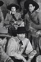 Joe Dominguez, Douglas Fowley, Rodolfo Hoyos Jr., and Hugh O'Brian in The Life and Legend of Wyatt Earp (1955)