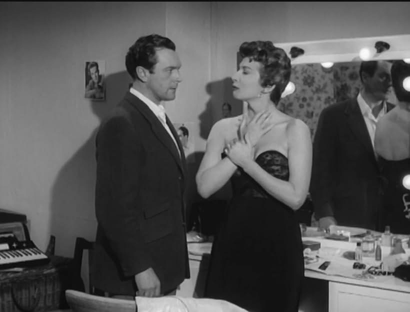 Carole Mathews and Brian Worth in Assignment Redhead (1956)