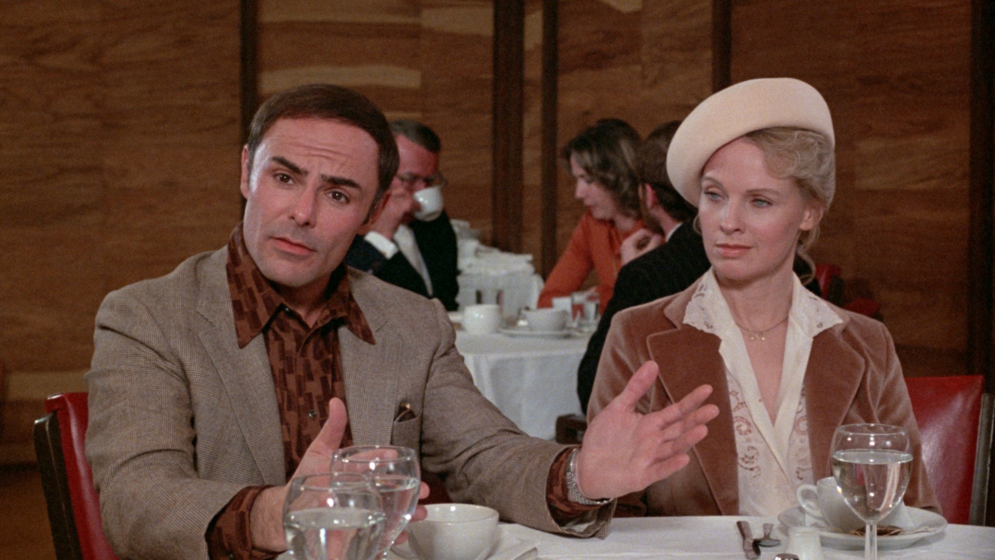 John Saxon and Angel Tompkins in The Bees (1978)