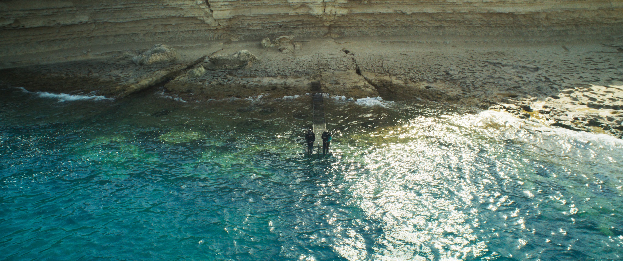 Louisa Krause and Sophie Lowe in The Dive (2023)