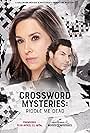 Lacey Chabert and Brennan Elliott in Crossword Mysteries: Riddle Me Dead (2021)