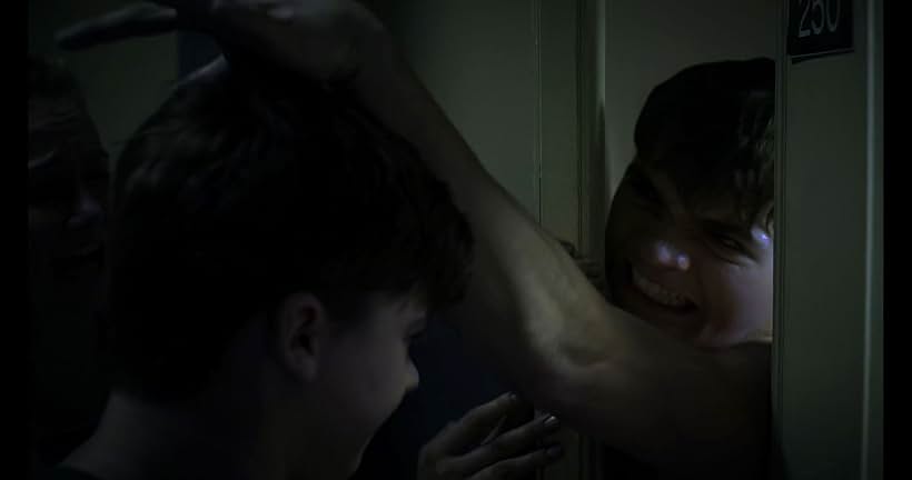 Joel Courtney in Assimilate (2019)