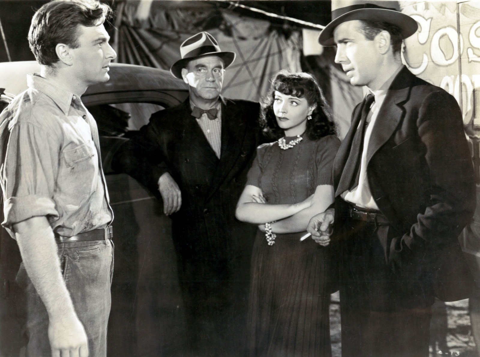 Humphrey Bogart, Eddie Albert, Cliff Clark, and Sylvia Sidney in The Wagons Roll at Night (1941)