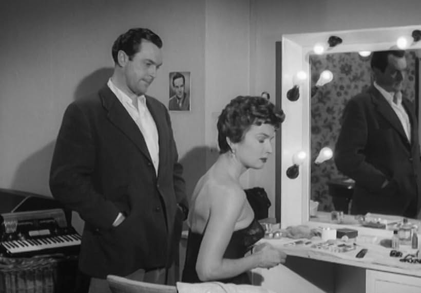 Carole Mathews and Brian Worth in Assignment Redhead (1956)