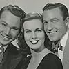 Gene Kelly, Deanna Durbin, and Dean Harens in Christmas Holiday (1944)