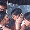 Nandita Das, Madhavan, Simran, and Keerthana Parthiepan in Kannathil Muthamittal (2002)