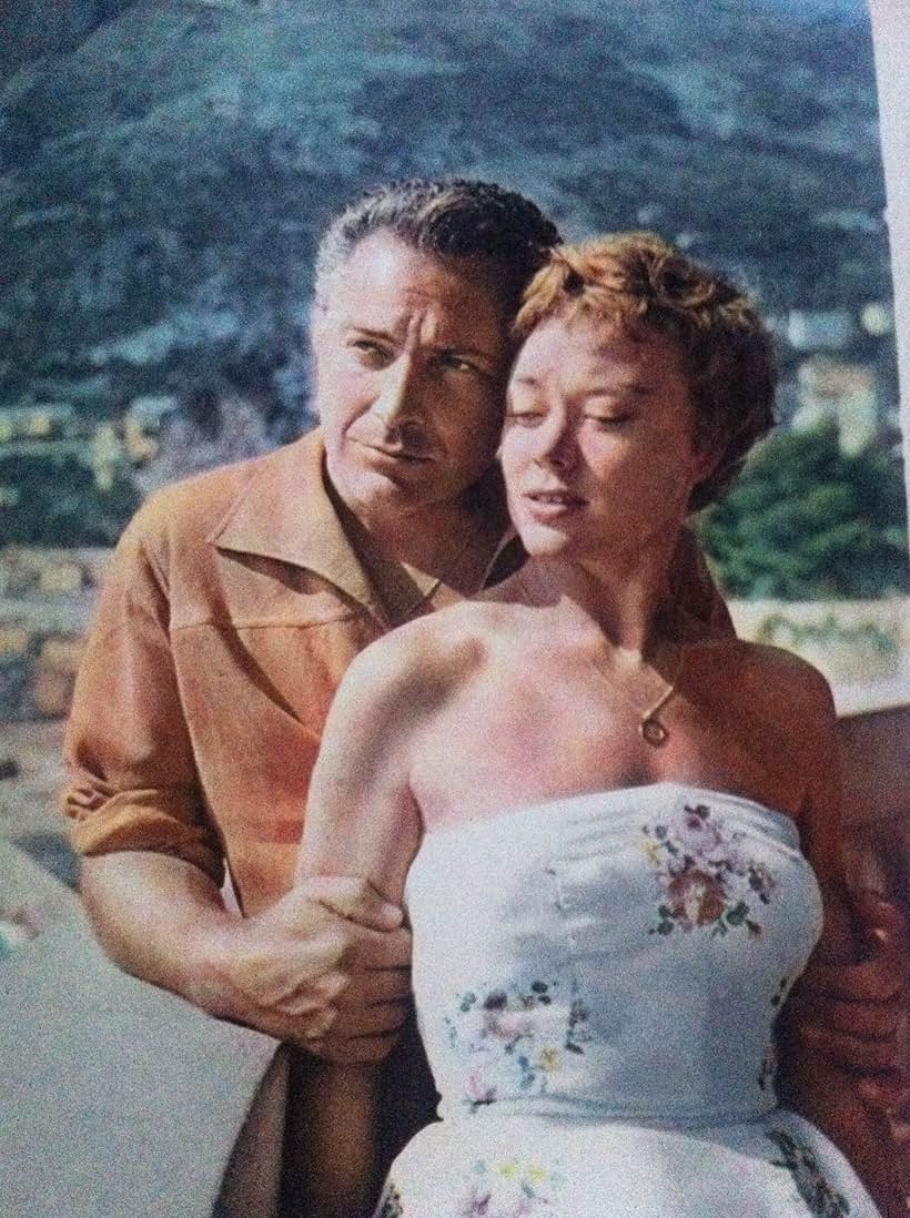 Rossano Brazzi and Glynis Johns in Loser Takes All (1956)