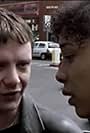 Sophie Okonedo and John Simm in Never Never (2000)