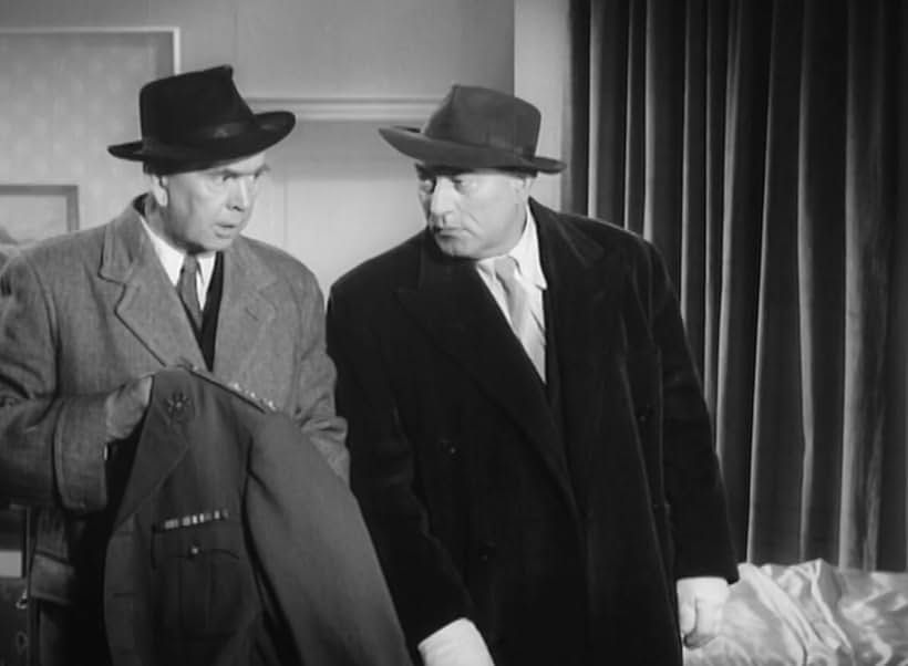 Ronald Adam and Danny Green in Assignment Redhead (1956)