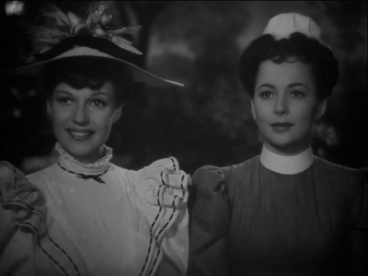 Olivia de Havilland and Rita Hayworth in The Strawberry Blonde (1941)