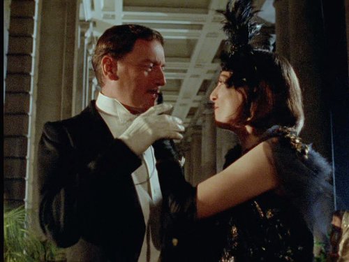 Peter Blythe and Joanna Phillips-Lane in Thám Tử Poirot (1989)