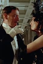 Peter Blythe and Joanna Phillips-Lane in Thám Tử Poirot (1989)