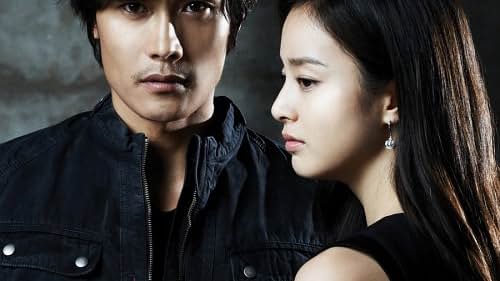 Lee Byung-hun and Kim Tae-hee in Mật Danh Iris (2009)