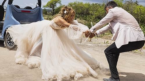 A couple's extravagant destination wedding is hijacked by criminals. In the process of saving their families, they rediscover why they fell in love in the first place.