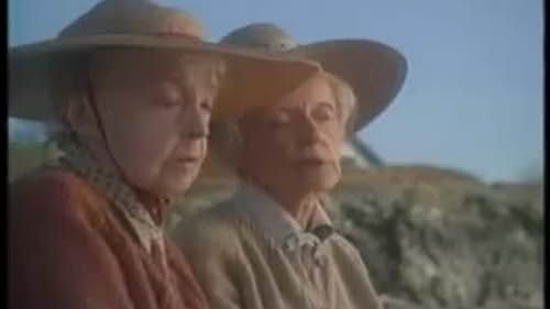 Two aged sisters reflect on life and the past during a late summer day in Maine.