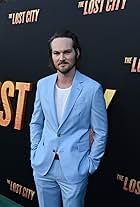 Adam Nee at Los Angeles premiere of The Lost City