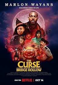 Marlon Wayans, John Michael Higgins, Kelly Rowland, Rob Riggle, and Priah Ferguson in Lời Nguyền Bridge Hollow (2022)