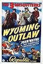 John Wayne, Ray Corrigan, and Raymond Hatton in Wyoming Outlaw (1939)