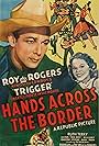 Roy Rogers, Ruth Terry, and Trigger in Hands Across the Border (1944)