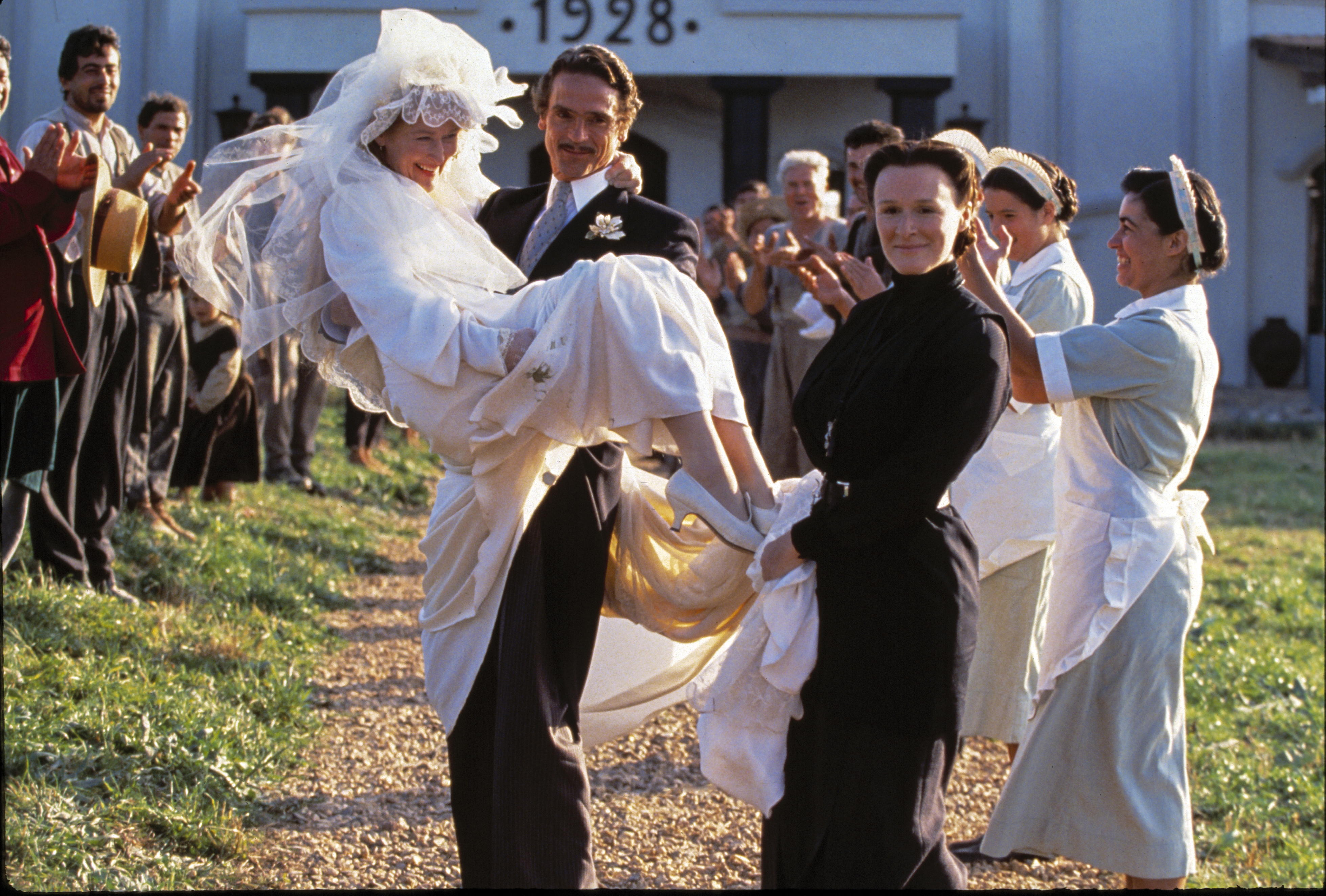 Glenn Close, Jeremy Irons, Meryl Streep, and Rolf Konow in The House of the Spirits (1993)