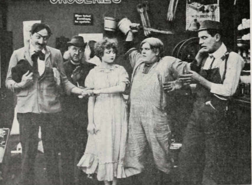 Thomas Delmar, Robert McKenzie, Eva Novak, and Chester Ryckman in Hearts and Flour (1917)