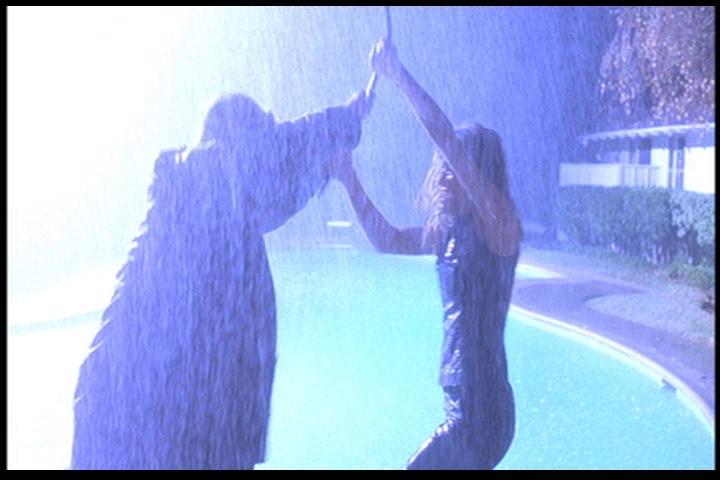 Kari Wuhrer and Jeff Trachta in Thy Neighbor's Wife (2001)